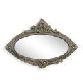 A CAST IRON OVAL MIRROR