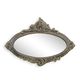 A CAST IRON OVAL MIRROR