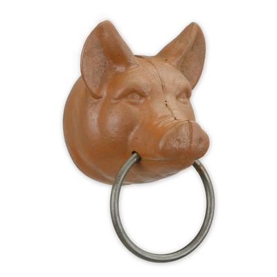 A CAST IRON PIG HEAD TOWEL HOLDER - BROWN
