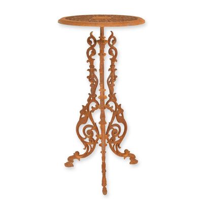A CAST IRON PLANT TABLE - RUSTY
