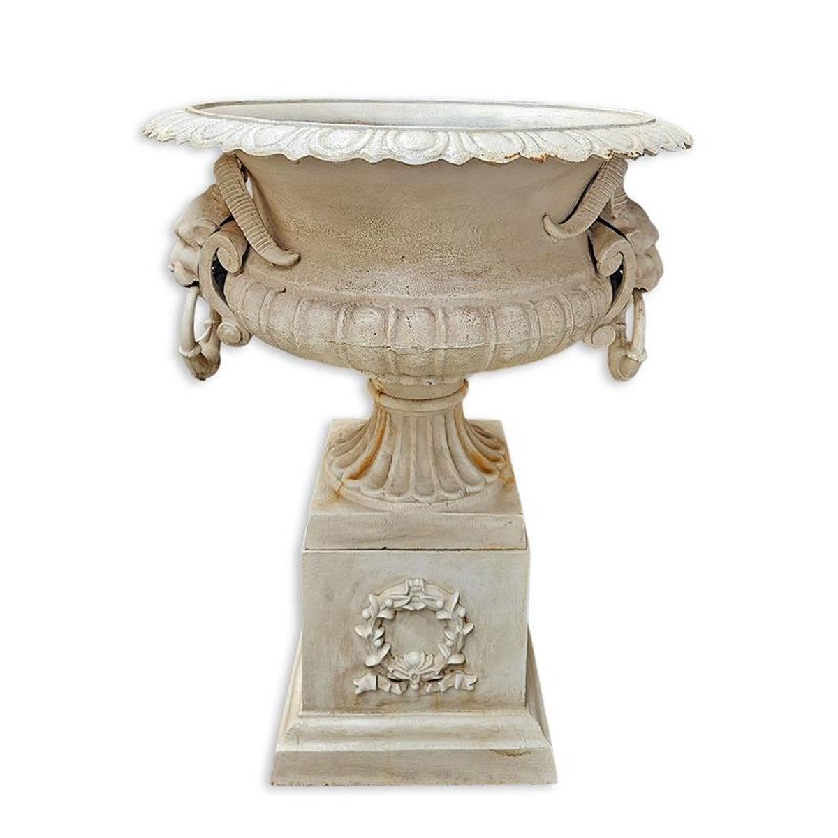 A CAST IRON PLANTER ON BASE