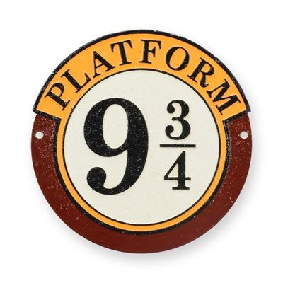 A CAST IRON "PLATFORM 9 3/4" PLAQUE