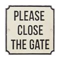 A CAST IRON PLEASE CLOSE THE GATE" SIGN"