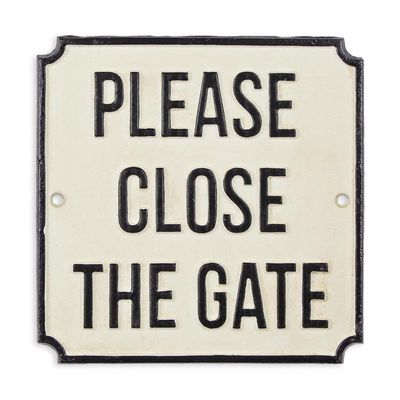 A CAST IRON PLEASE CLOSE THE GATE" SIGN"