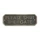 A CAST IRON PLEASE SHUT THE GATE" PLAQUE"