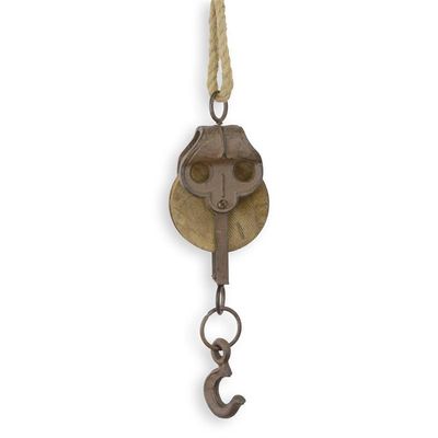 A CAST IRON PULLEY ON ROPE