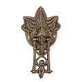 A CAST IRON PUTTO ON SWING DOORKNOCKER