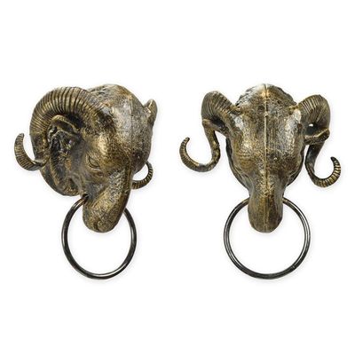 A CAST IRON RAM HEAD TOWEL HOLDER