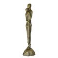 A CAST IRON SCULPTURE OF AN EMBRACING COUPLE - BRONZE LOOK