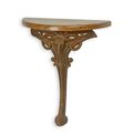 A CAST IRON SIDE TABLE MOUNTED WITH WOODEN TOP - RUSTY