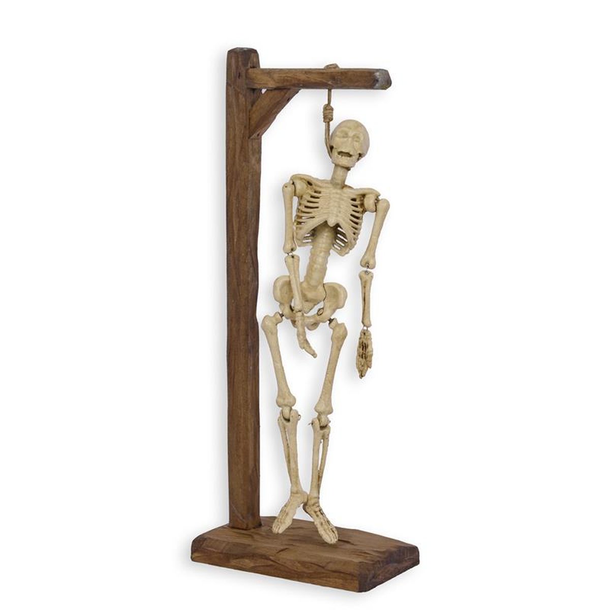 A CAST IRON SKELETON HANGING ON A WOODEN GALLOWS