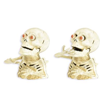 A CAST IRON SKELETON MECHANICAL BANK