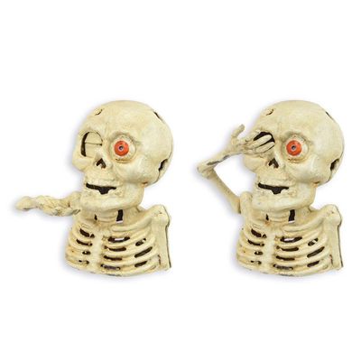 A CAST IRON SKELETON MECHANICAL BANK