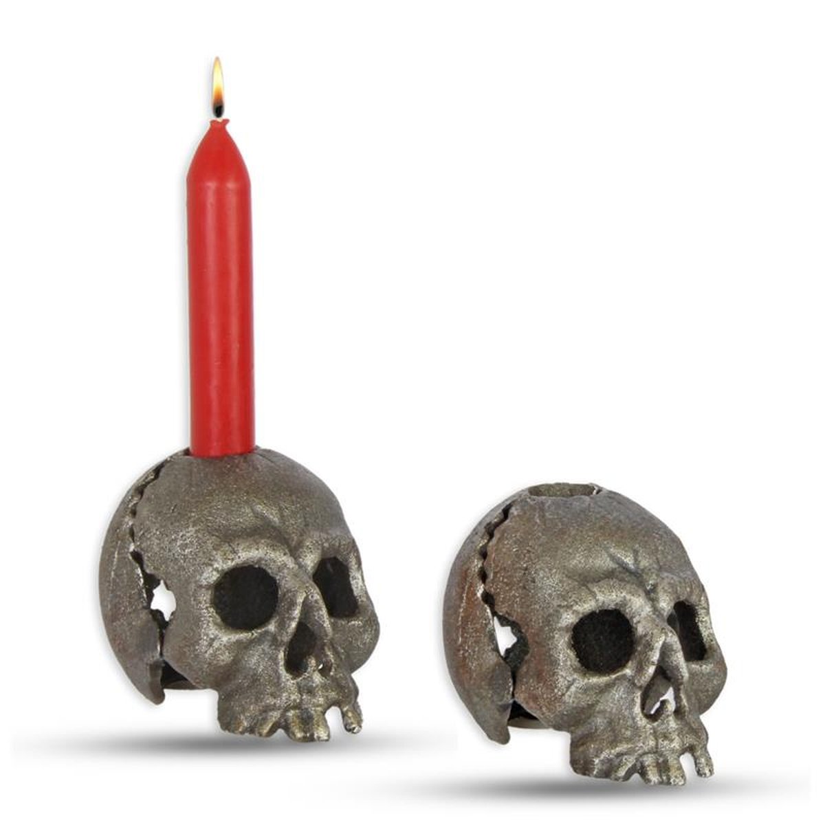 A CAST IRON SKULL CANDLE HOLDER, OLD SILVER