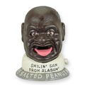 A CAST IRON SMILIN' SAM MECHANICAL BANK