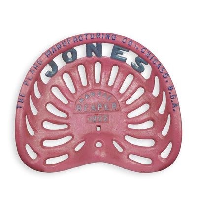 A CAST IRON TRACTOR SEAT THE PLANO MFG CO. CHICAGO""
