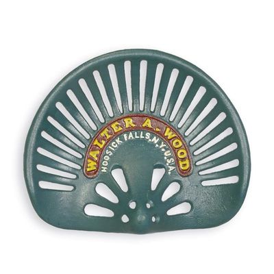 A CAST IRON TRACTOR SEAT WALTER A. WOOD""
