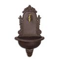 A CAST IRON WALL FOUNTAIN