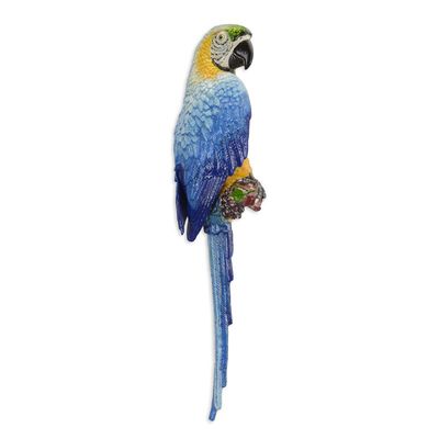 A CAST IRON WALL MOUNT BLUE AND YELLOW MACAW