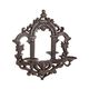 A CAST IRON WALL SCONCE WITH MIRROR