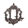 A CAST IRON WALL SCONCE WITH MIRROR