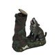A CAST IRON WOLF LOOKING UP TREE MECHANICAL BANK