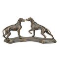 A CST IRON FIGURINE OF TWO HOUNDS MOUNTED ON BASE
