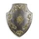 A DECORATED IRON WALL MOUNT SHIELD - SILVER & GOLD