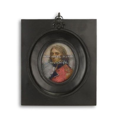 A FRAMED PORTRAIT