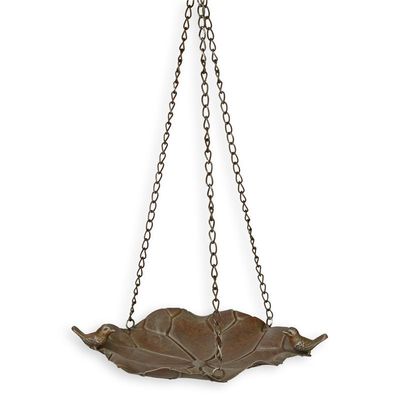 A HANGING IRON BIRD BATH