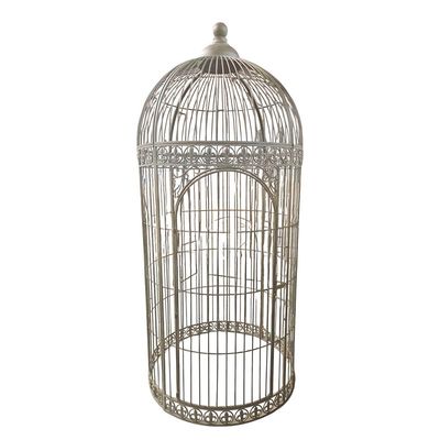 A LARGE IRON BIRD CAGE