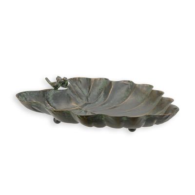 A LEAF SHAPED IRON BIRD BATH