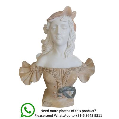 A MARBLE BUST OF A WOMAN