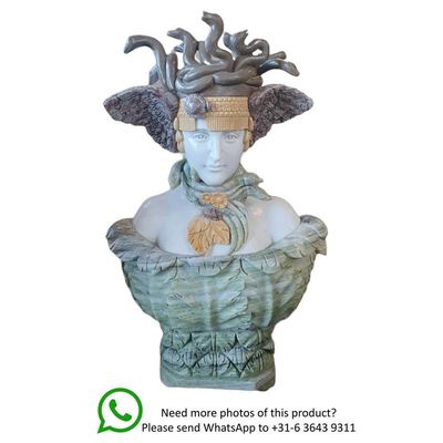 A MARBLE BUST OF MEDUSA