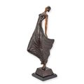 A MODERNIST BRONZE OF A LADY IN DRESS