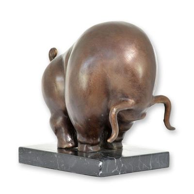 A MODERNIST BRONZE SCULPTURE OF A CHARGING BULL
