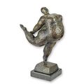 A MODERNIST BRONZE SCULPTURE OF A FEMALE NUDE DANCER
