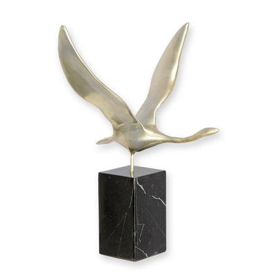 A MODERNIST BRONZE SCULPTURE OF A FLYING SWAN - OLD SILVER