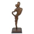 A MODERNIST BRONZE SCULPTURE OF A LOVING COUPLE