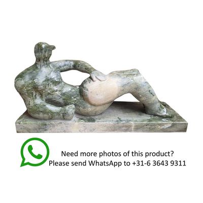 A MODERNIST BRONZE SCULPTURE OF A RECLING MALE NUDE
