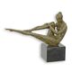 A MODERNIST BRONZE SCULPTURE OF A RECLINING FEMALE NUDE