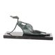 A MODERNIST BRONZE SCULPTURE OF A RECUMBENT FEMALE NUDE