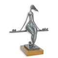 A MODERNIST BRONZE SCULPTURE OF A RELAXING FEMALE NUDE