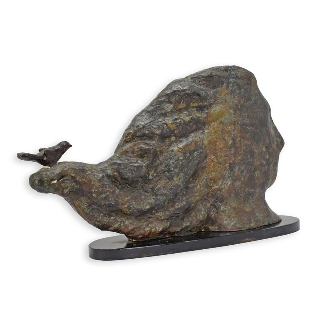 A MODERNIST BRONZE SCULPTURE OF A ROCK CARVED FACE