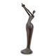 A MODERNIST BRONZE SCULPTURE OF A WOMAN HOLDIGN A BIRD