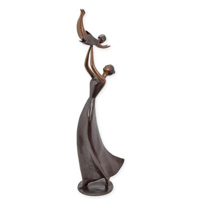 A MODERNIST BRONZE SCULPTURE OF A WOMAN HOLDING A CHILD