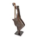 A MODERNIST BRONZE SCULPTURE OF A WOMAN IN DRESS