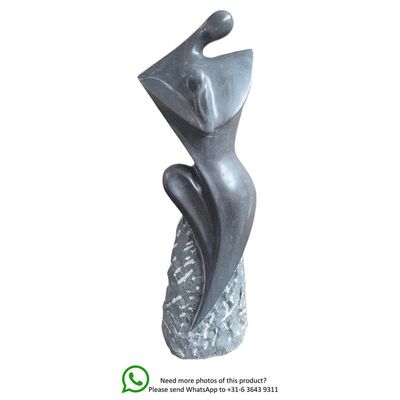 A MODERNIST MARBLE SCULPTURE OF A SITTING FEMALE NUDE
