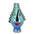 A MURANO STYLE ABSTRACT FACE GLASS VASE