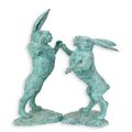 A PAIR OF BRONZE BOXING HARES